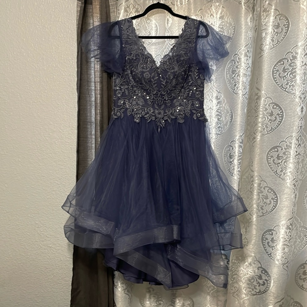 A-line V-neck Asymmetrical cocktail dress with sequins.